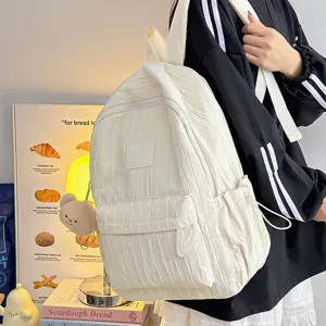 Solid color pleated backpack for women and students stylish lightweight casual school bookbag