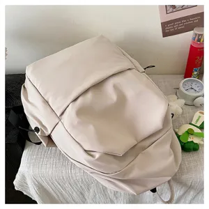 Solid color large capacity casual backpack detail view, perfect for daily school and commuting.