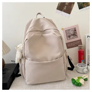 Casual solid color large capacity school backpack with cute bear pendant for daily use
