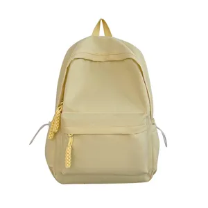 Casual minimalist student backpack with cute braided zipper pulls for daily school use.