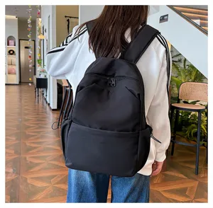 Casual black large capacity backpack for students daily school and outdoor use travel.