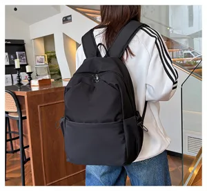 Classic solid color large capacity casual backpack for students and daily commuting use.