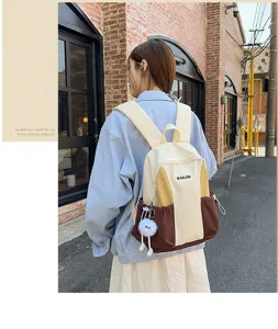 Stylish color-block backpack for women and students lightweight canvas casual travel daypack.