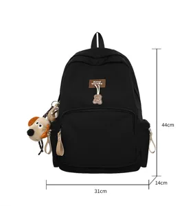 Black canvas school backpack for students, large capacity casual daily book bag with pockets.