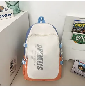 Stylish colorblock backpack with large capacity for daily school and college campus use.