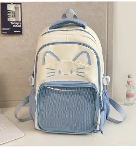 Cute Japanese style cat ita bag Y2K backpack with clear mesh front pocket for daily student use.