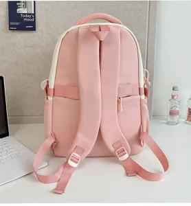 Cute pink white student backpack detail, Y2K aesthetic school bag with adjustable straps.