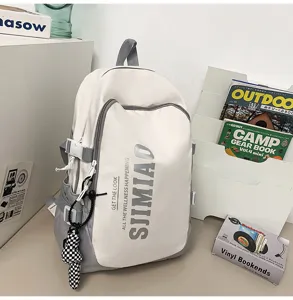 Large capacity school backpack for students, stylish contrast color design, casual daypack.