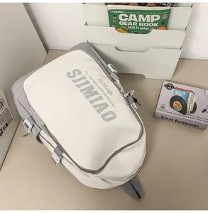 Large capacity casual backpack in white and grey, detailed view showing stylish letter print.