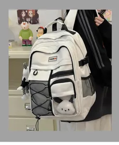 Detail shot of white utility backpack with transparent pocket, multi-compartment design.