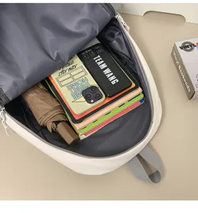 Large capacity school backpack for students, stylish computer daypack with multi-layer storage.