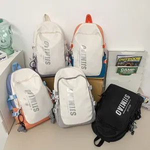 Large capacity student backpack, stylish color-block school bag for teenagers and college youth.