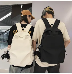 Minimalist large capacity canvas casual backpack stylish school bag for men and women daily use