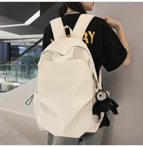 Minimalist large capacity canvas backpack in cream color, versatile casual school rucksack.