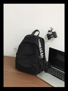 Casual minimalist black backpack for women, stylish school bag for students and daily use.