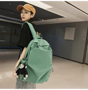Minimalist large capacity mint green backpack, casual school bag for daily use and college students.