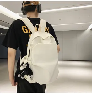 Minimalist large capacity canvas backpack suitable for college students daily casual use.