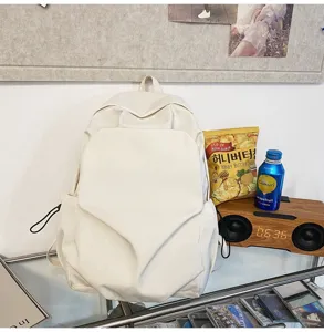 Minimalist solid color large capacity canvas backpack, detailed view of simple casual daily bag.