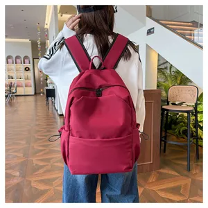 Casual large capacity solid color backpack for women men daily commuting school book bag red