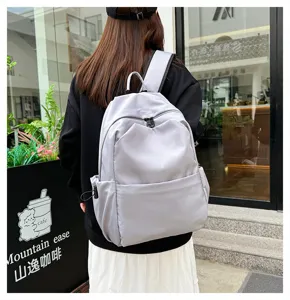 Casual grey backpack with large capacity ideal for daily commuting, school and student travel.