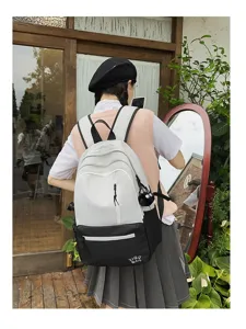 Canvas contrast color school backpack for students, stylish large capacity laptop bookbag.