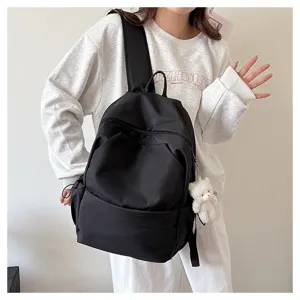 Casual large capacity solid color black backpack for women and students with bear pendant.