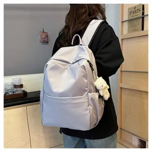 Minimalist solid color large capacity backpack casual daypack for daily travel and school use