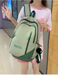 Green student large capacity school backpack casual dual shoulder bag detail view for teen girls.