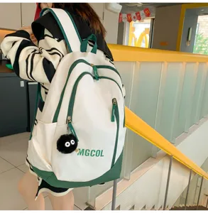 Large capacity student backpack in white and green, durable and stylish for daily school.
