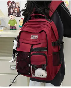 Ergonomic casual school backpack for teenagers, large capacity red bookbag with multiple pockets.