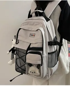 Utility style large capacity student school backpack, lightweight commuter bookbag with pockets.