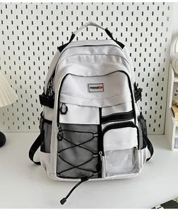 Utility white backpack detail with multi pockets, side mesh pouches and a transparent front pocket.