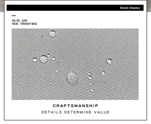 Detailed view of waterproof backpack fabric with visible texture and water-resistant droplets.