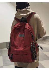 Casual retro canvas backpack for women, large capacity school bag with zipper pockets.