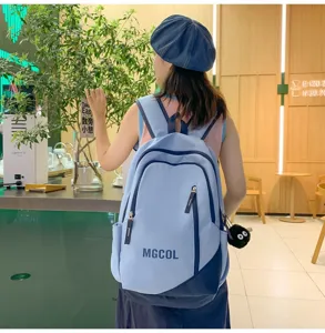 Large capacity school backpack for students, light blue dual shoulder bag with stylish design.