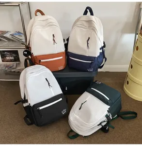 Casual color block campus backpack for students, stylish double shoulder computer bag with large capacity.