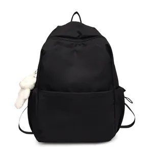 Casual solid color large capacity backpack for school and daily use with cute plush pendant.