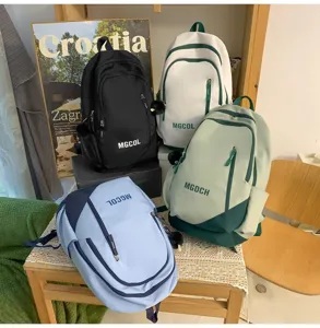 Stylish large capacity student school backpack, durable multi-color casual daypack for teens.
