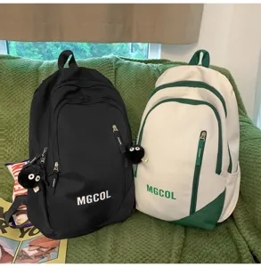 Large capacity school backpack for students, stylish double-shoulder book bag with cute pendant.