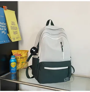 Minimalist color block backpack for women, stylish campus student school bag with multi pockets.