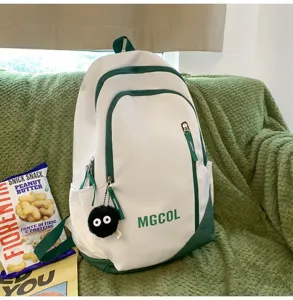 Large capacity student school backpack with cute plush charm for daily use and travel.