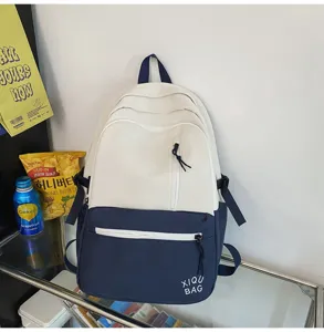 Color-block campus backpack for students, minimalist trendy laptop bag with front pocket.