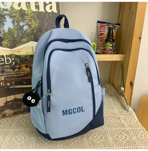 Light blue school backpack with dark blue trim, spacious main compartment and front pocket.