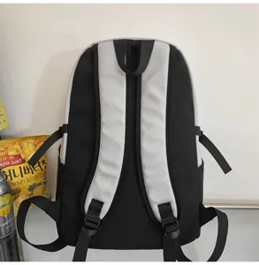 Minimalist color-block campus backpack for students, trendy design laptop school bag.