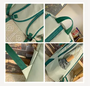 Green school backpack detail view showing adjustable straps, top handle and side pocket.