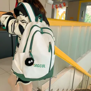 Large capacity school backpack for girls students with contrast color and cute pendant.