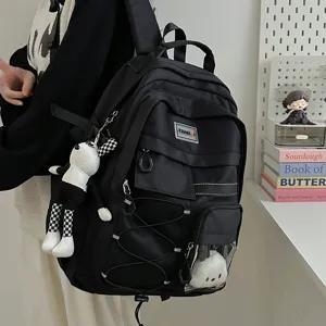 Black tactical backpack for students large capacity school bag with cute pendant main view