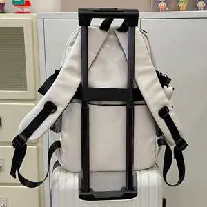 White large capacity student school backpack with convenient luggage trolley strap main view.