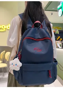 Mochila escolar casual y elegante para mujeres y estudiantes con cremalleras rojas de moda.