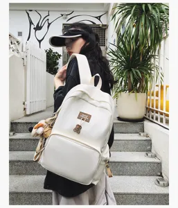 Minimalist campus backpack, large capacity solid color school bag for students. Detail view.